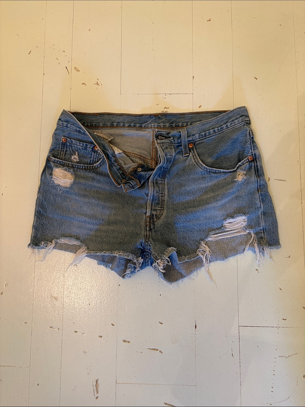 Levi’s 501 Light Blue Distressed Denim Cutoff Shorts